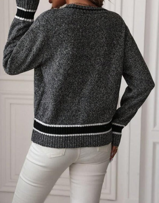 Grey long sleeve V-neck sweater