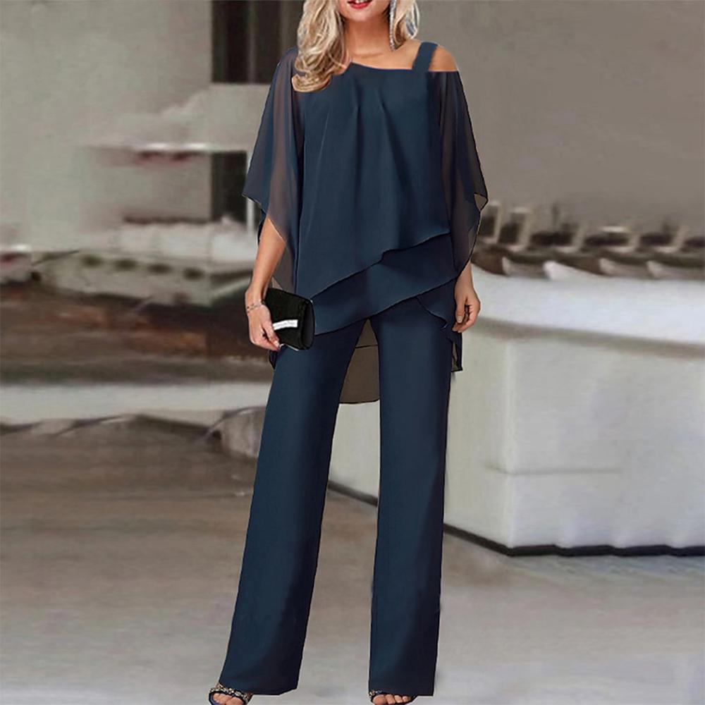 Navy blue two-piece set of gathered top and trousers with cold shoulders