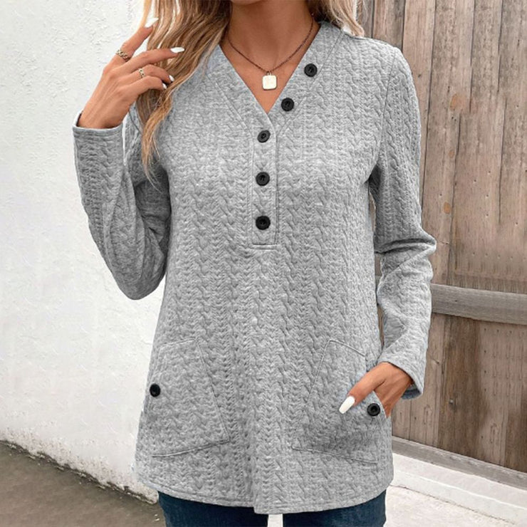 Comfortable monochrome sweater with long sleeves and V-neck