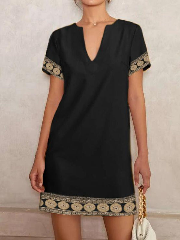 Trendy black mini dress with short sleeves