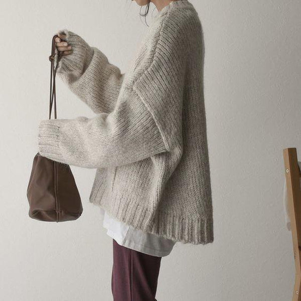 Oversize sweater with ivory pocket front