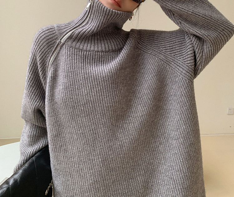 Grey solid color sweater with high neckline