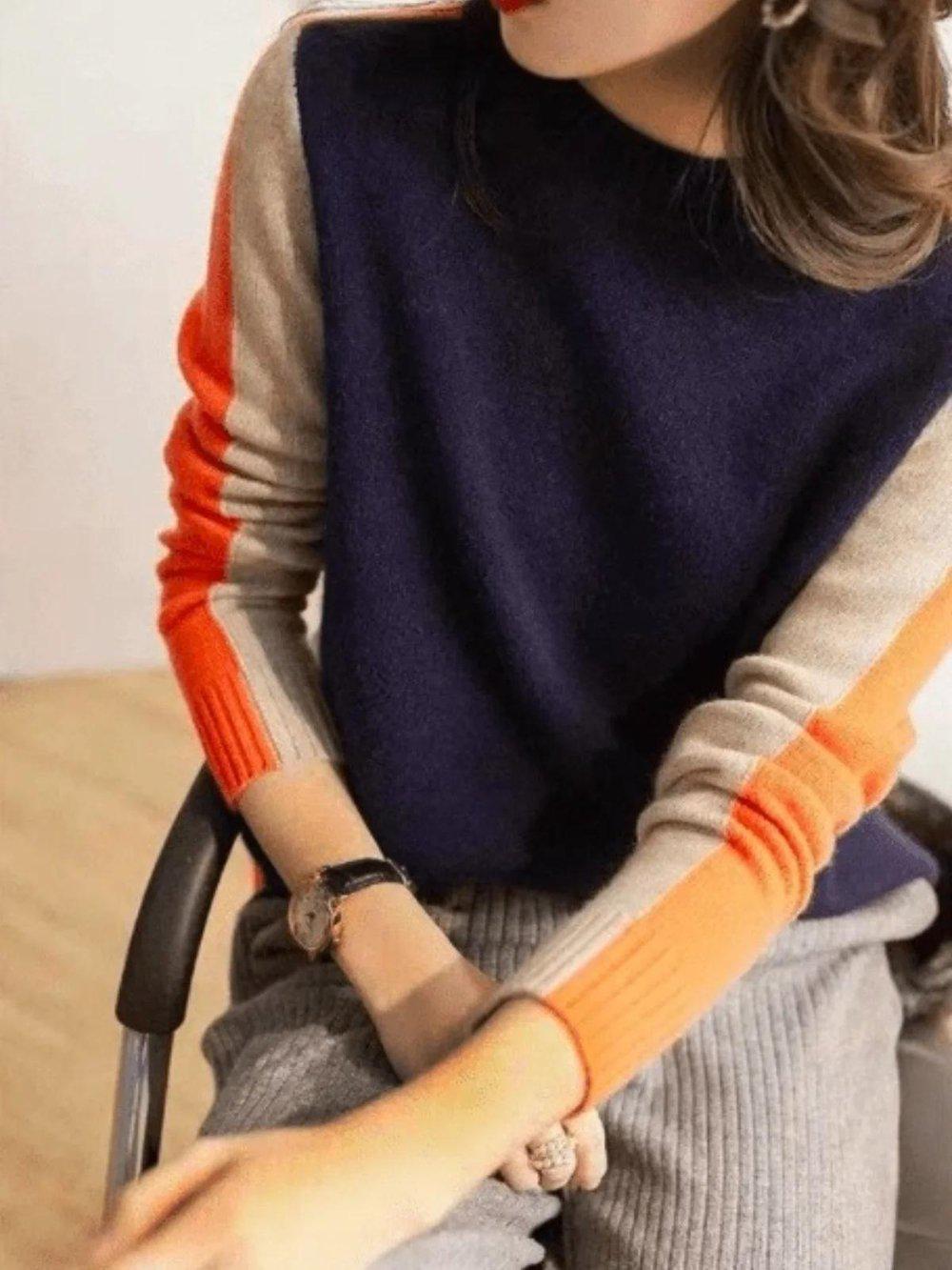 Navy blue and orange sweater with retro stripes