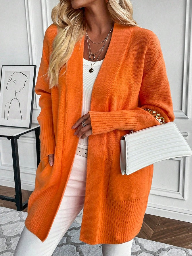 Orange solid colour cardigan with long sleeves