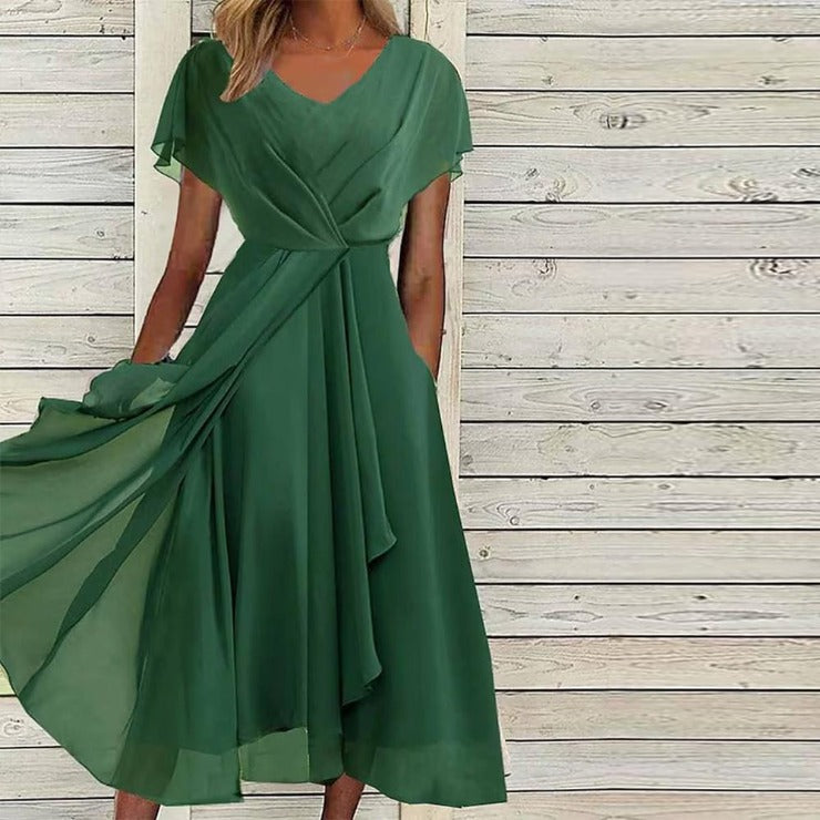 Green midi dress with pleated front slit and jewels