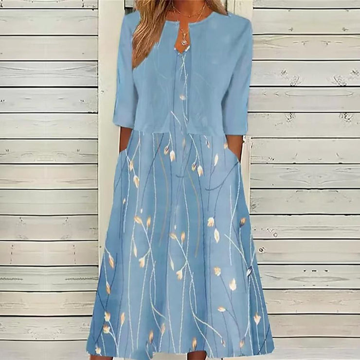 Blue Twofer midi dress with half sleeves and floral print