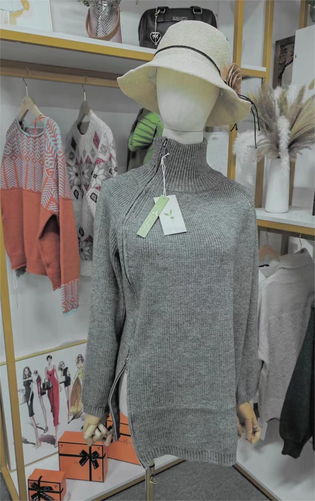 Grey solid color sweater with high neckline