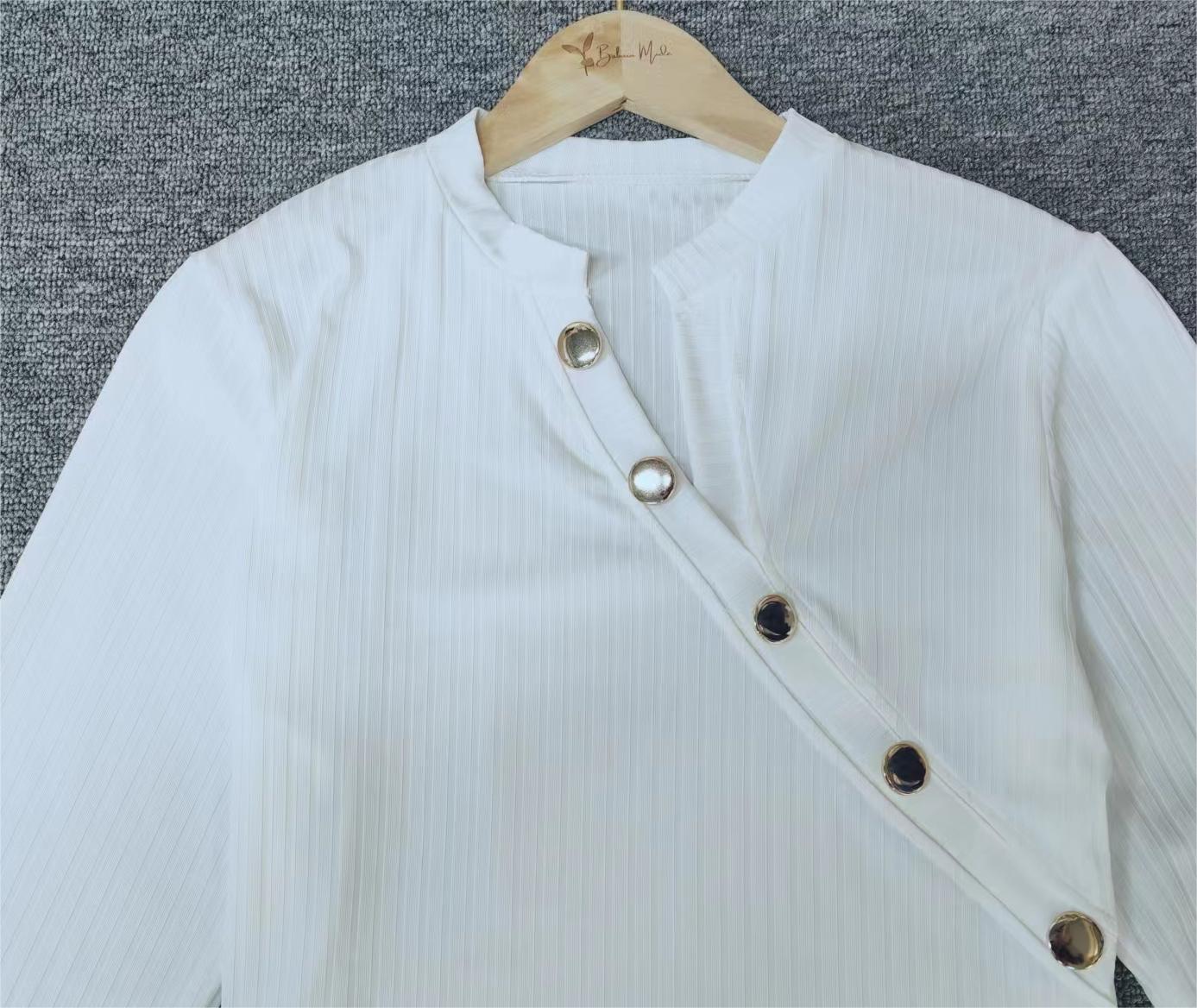 White asymmetrical long sleeve top with button placket