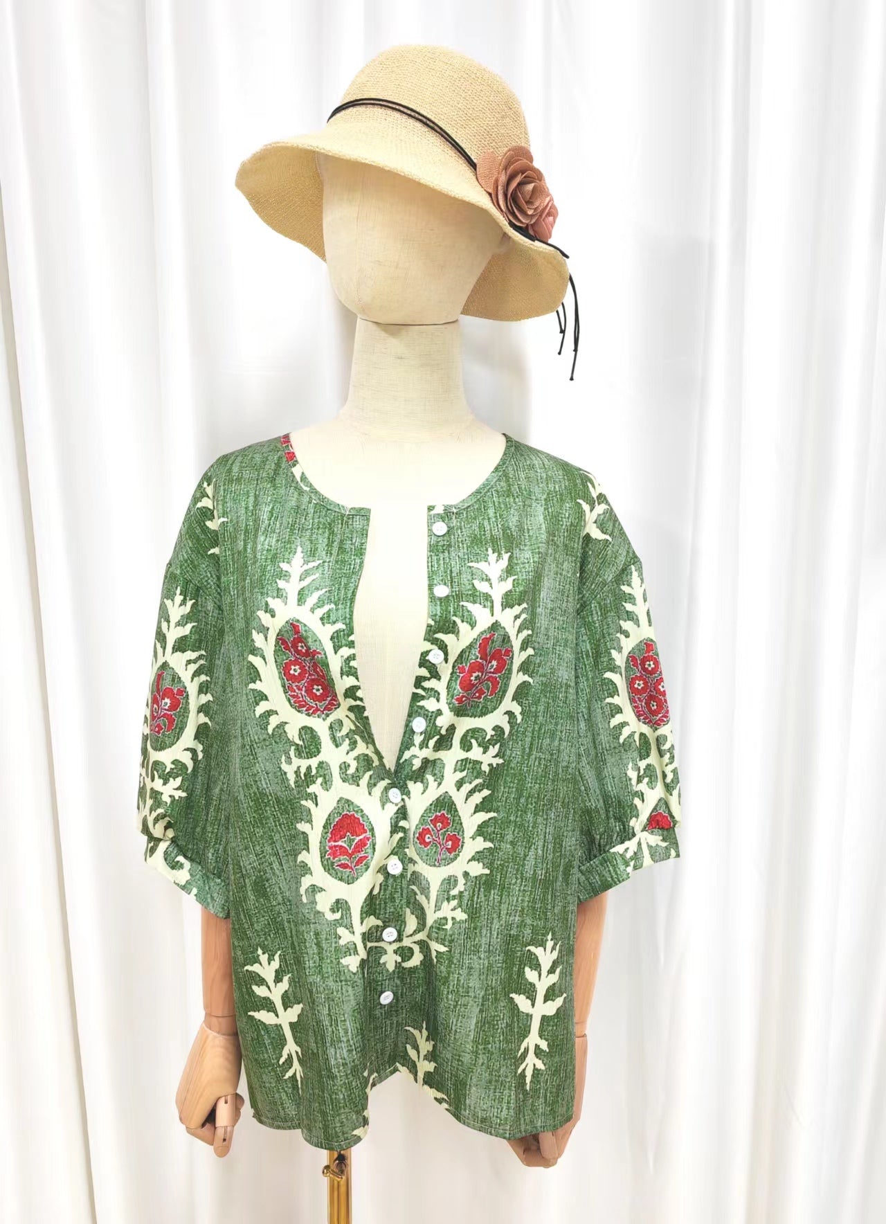 Green boho blouse with deep V-neck