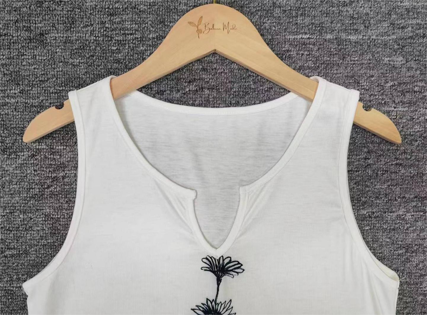 White Daisy sleeveless tank top with notched neckline