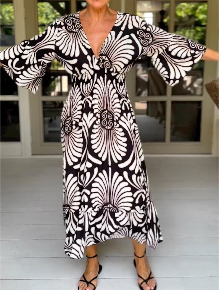 Black and white maxi dress with 3/4-length sleeves