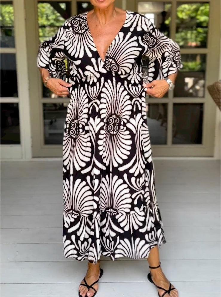 Black and white maxi dress with 3/4-length sleeves