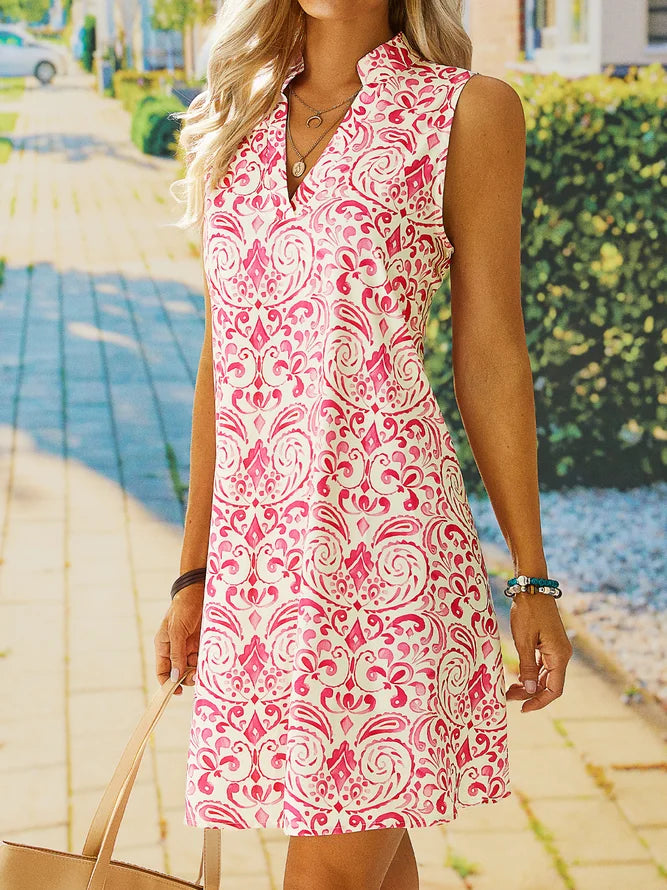 Cute sleeveless mini dress with rose print