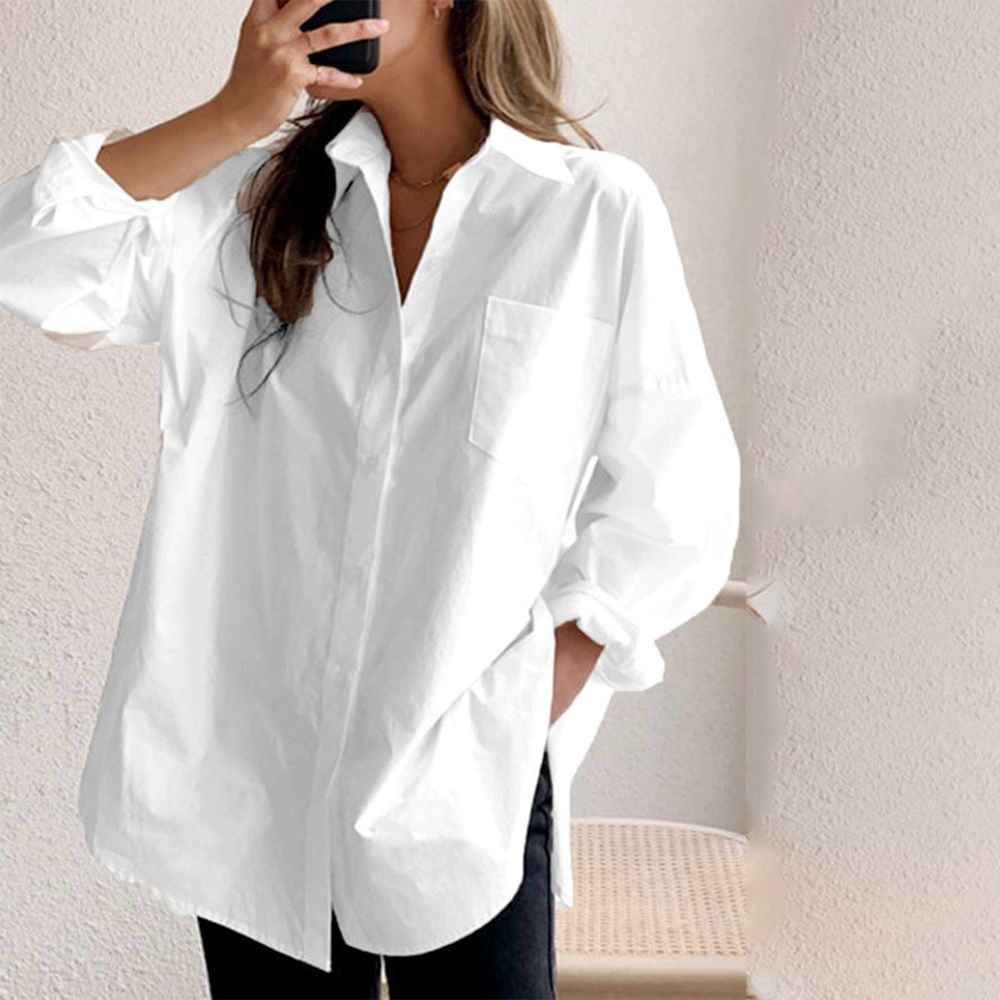 White solid color shirt with collar and long sleeves