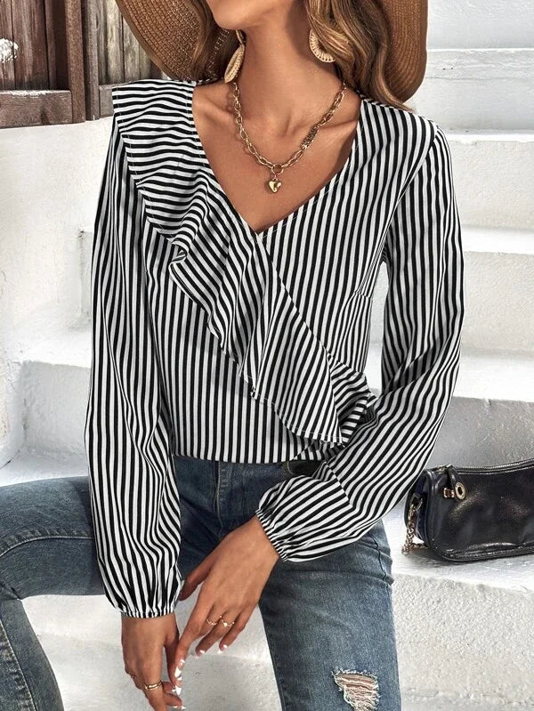 Ruffled black and white striped long sleeve top