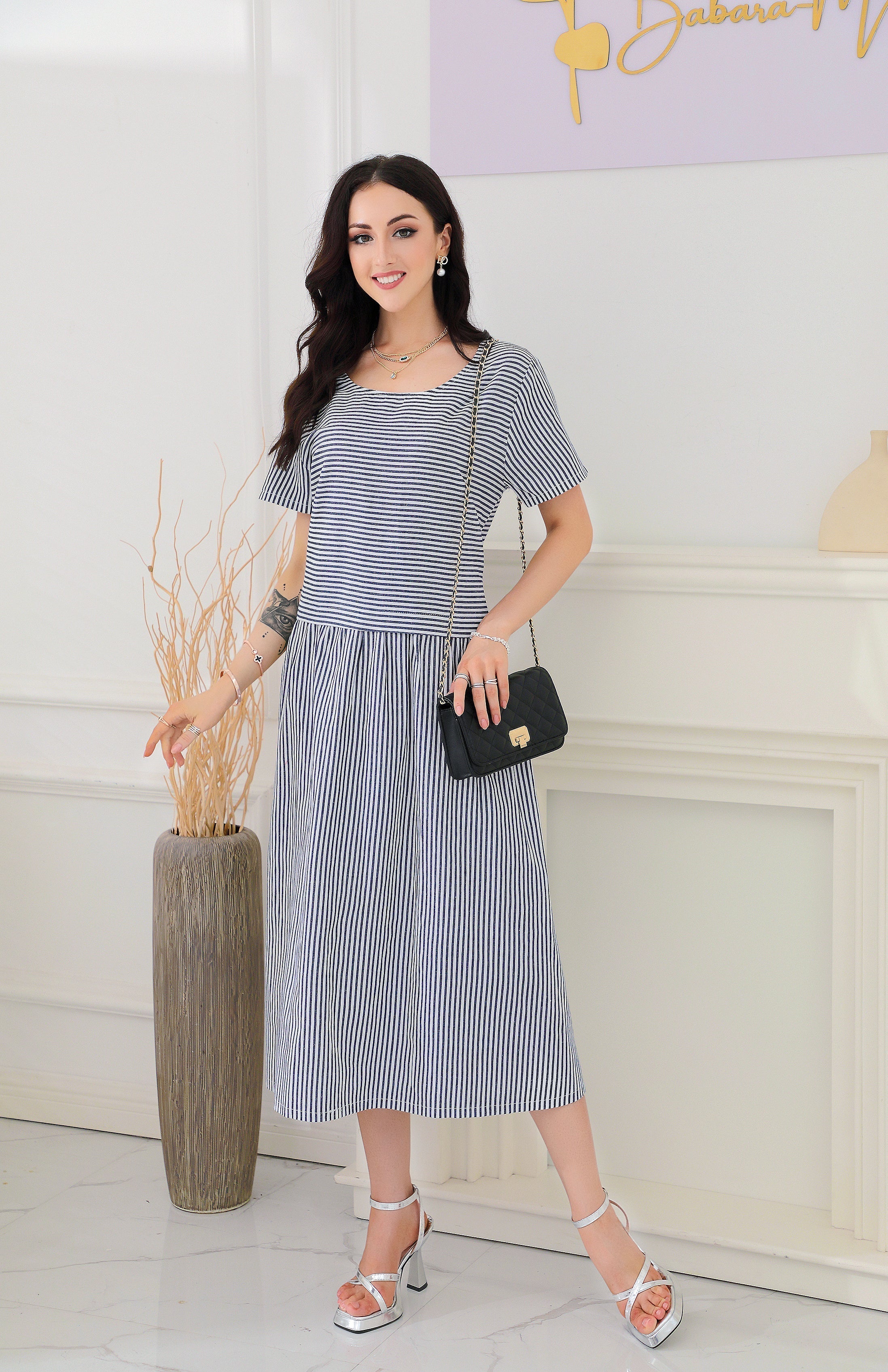 Navy blue and white striped midi dress with short sleeves