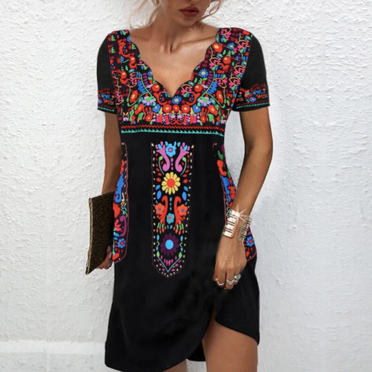 Colorful mini dress with aztec pattern and empire waist