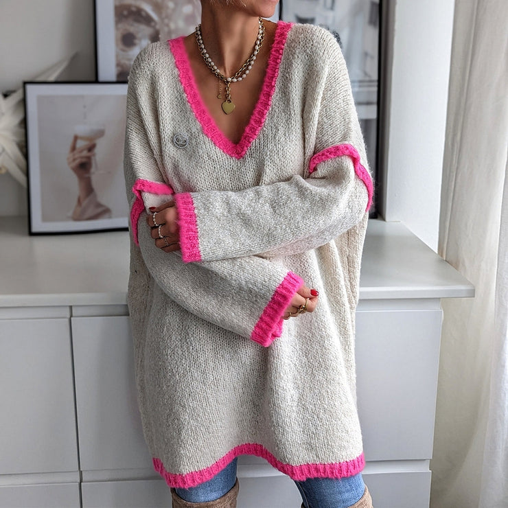 Pink V-neck sweater with baggy trim