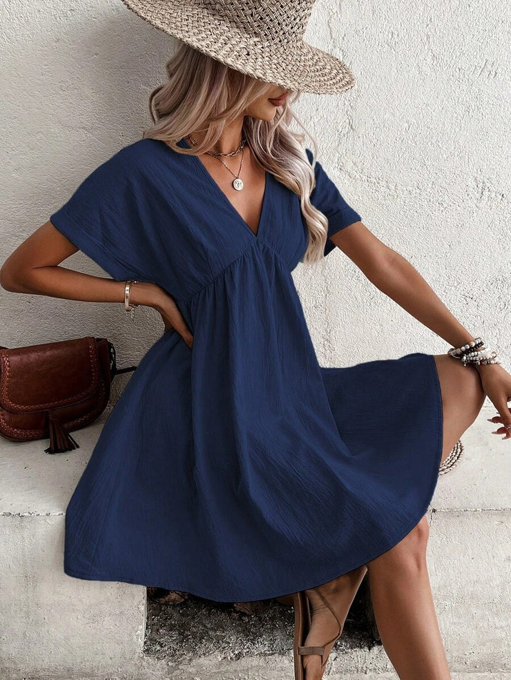 Navy blue monochrome mini dress with short sleeves