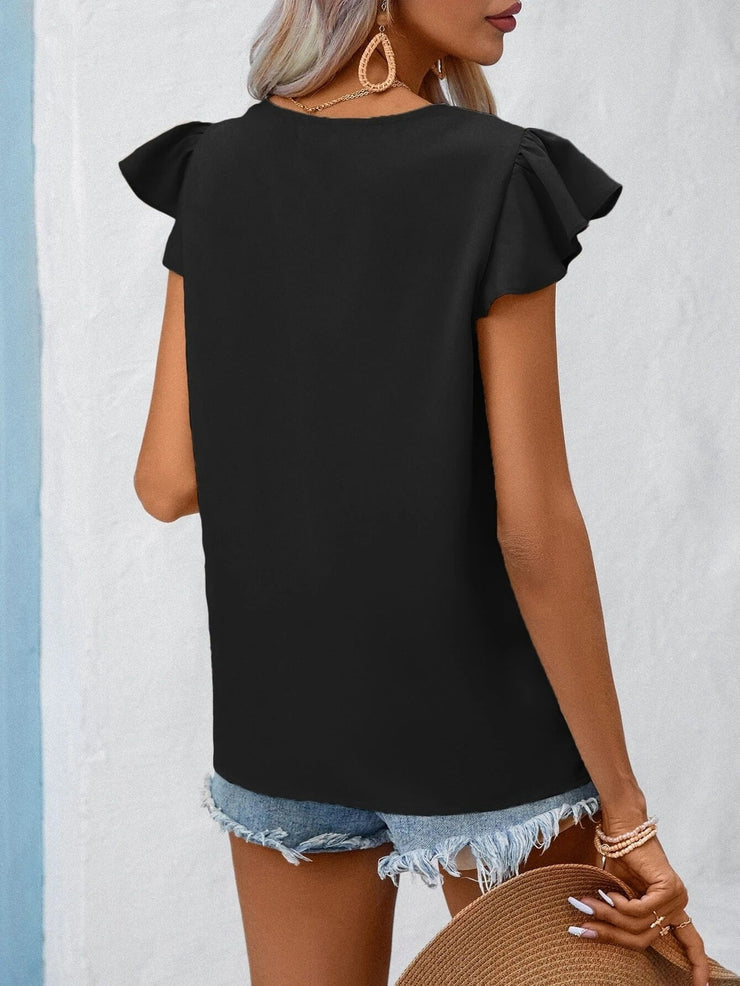 Cool monochrome black top with V-neck