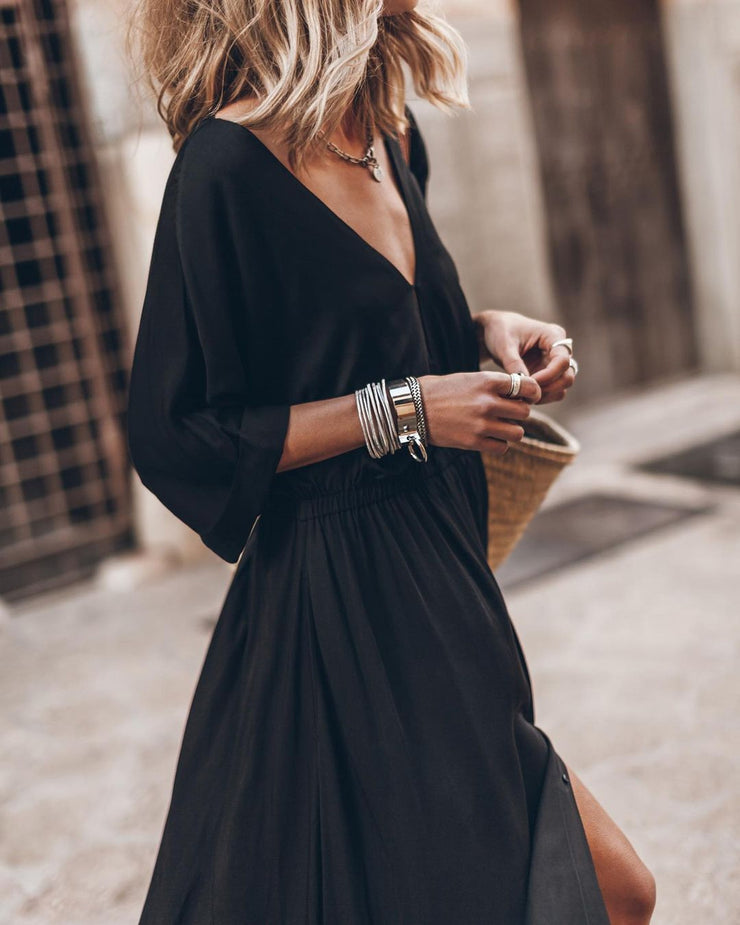 Elegant monochrome black maxi dress with V-neck