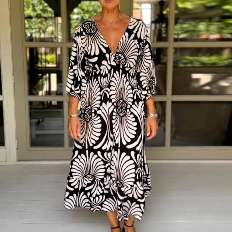 Black and white maxi dress with 3/4-length sleeves