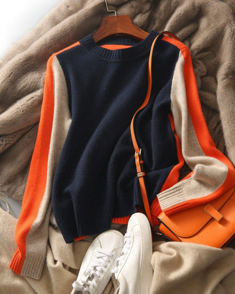 Navy blue and orange sweater with retro stripes