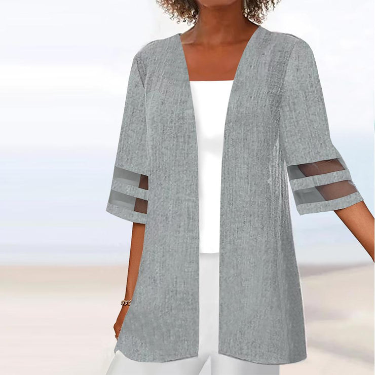 Grey cardigan with three quarter sleeves and transparent stripes