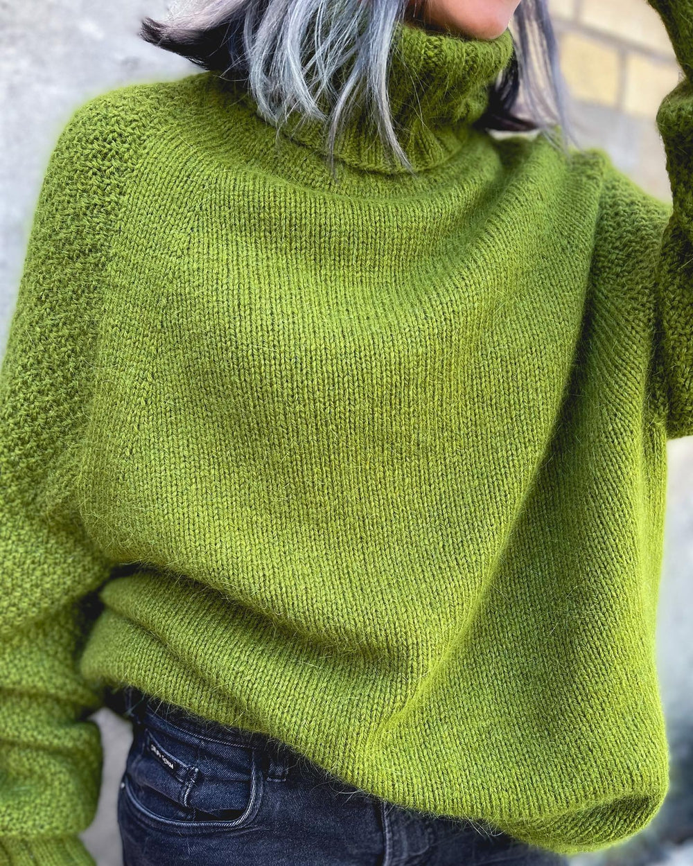 Grass green oversized knitted turtleneck sweater