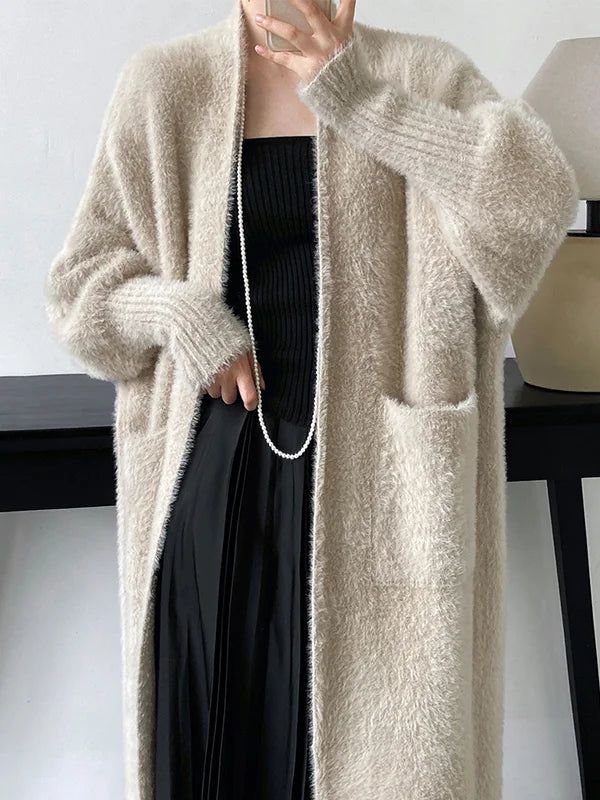 Distinctive plain cardigan with long sleeves