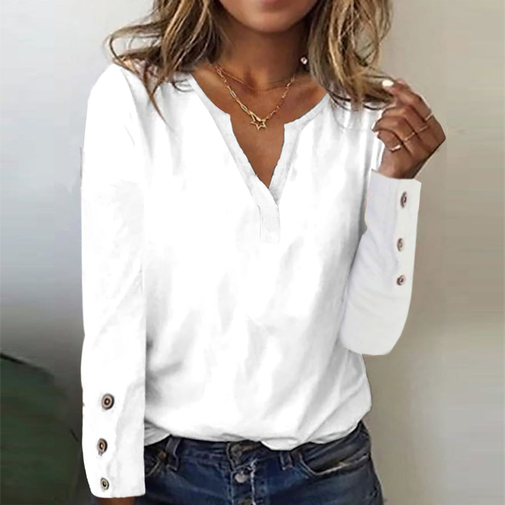 White basic top with long sleeves and button placket