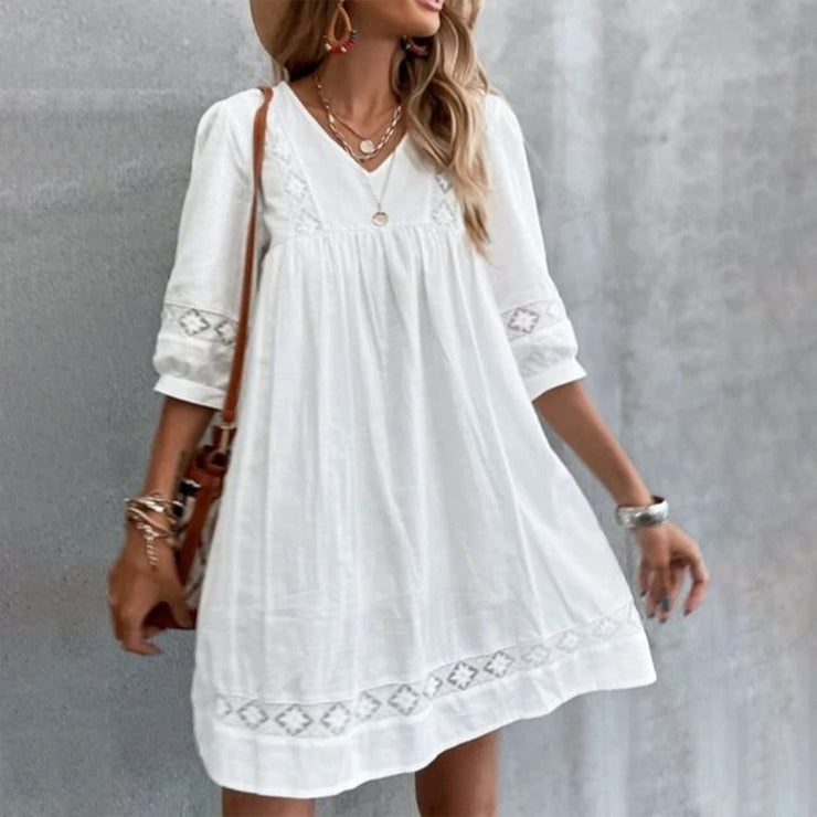 Popular monochrome mini dress with 3/4-length sleeves