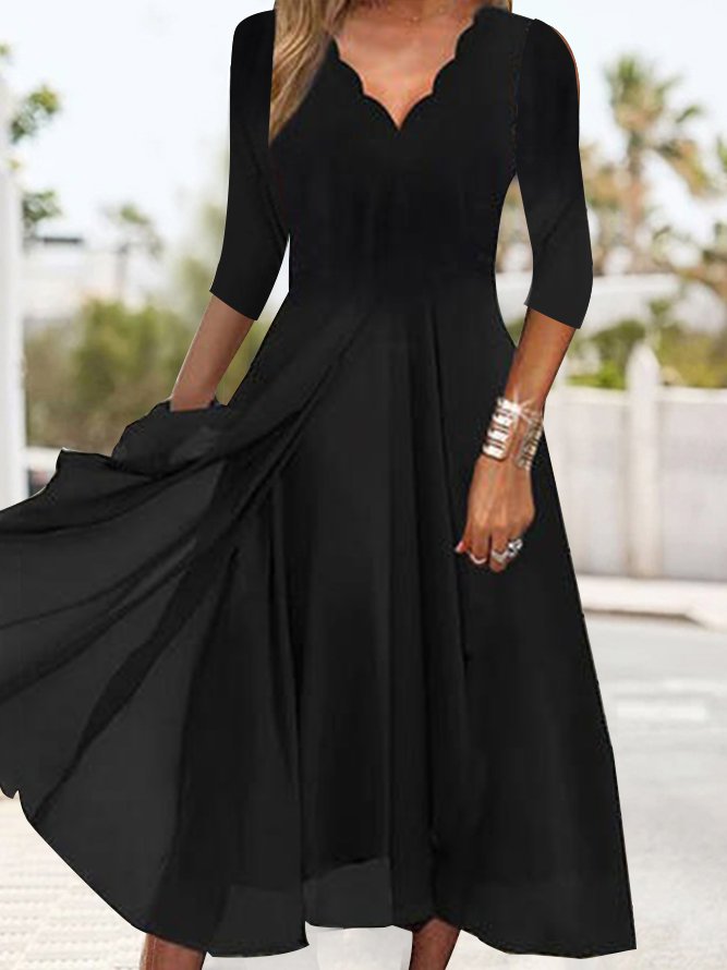 Solid black midi dress with 3/4-length sleeves