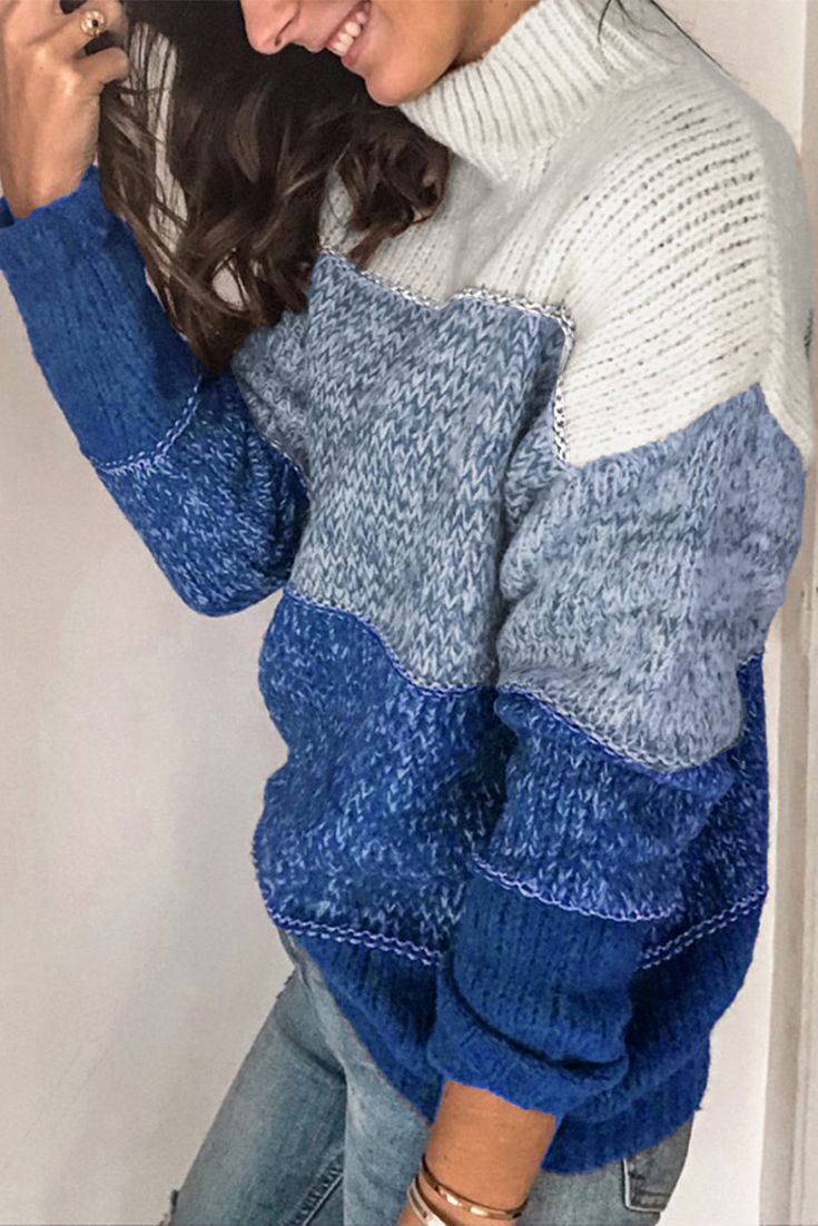 Blue long sleeve sweater with high neckline