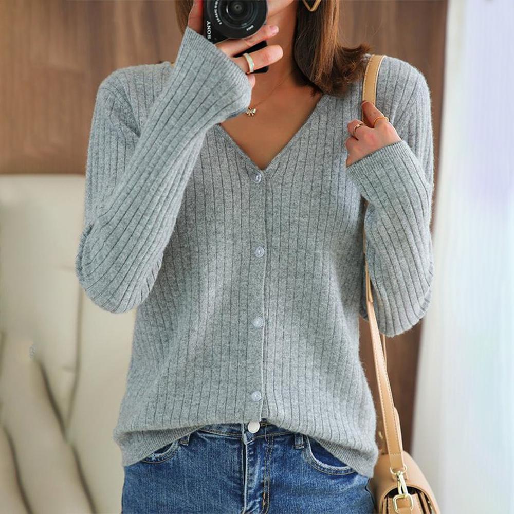 Grey solid color sweater with long sleeves