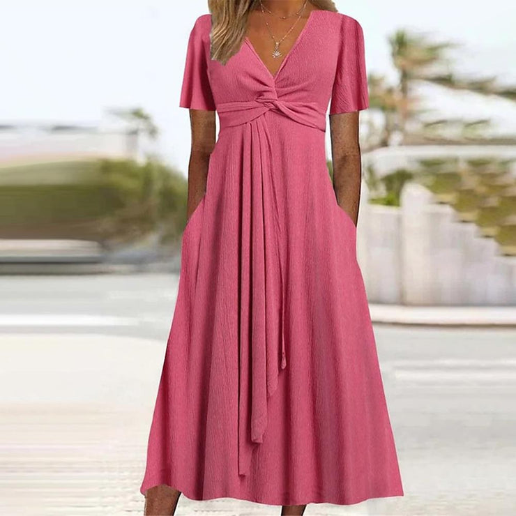 Pink solid color midi dress with short sleeves