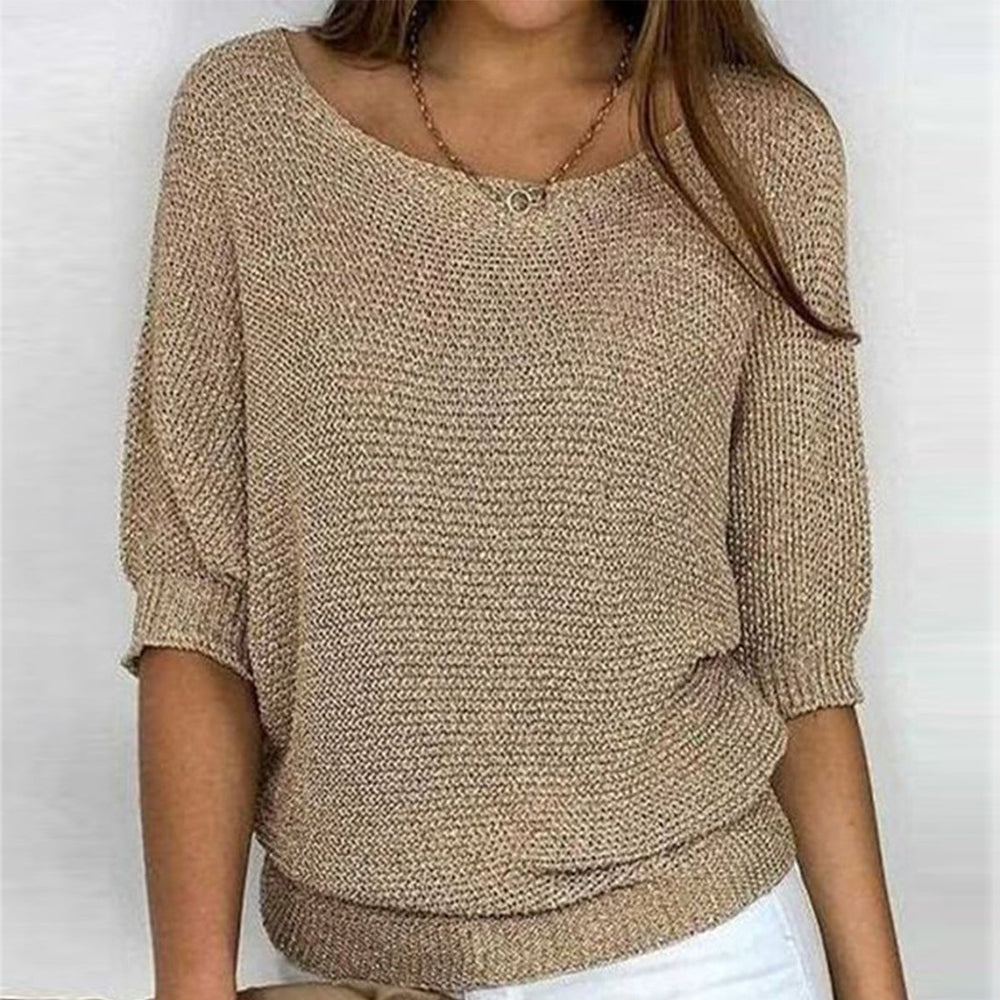 Gold colored solid color sweater with round neckline