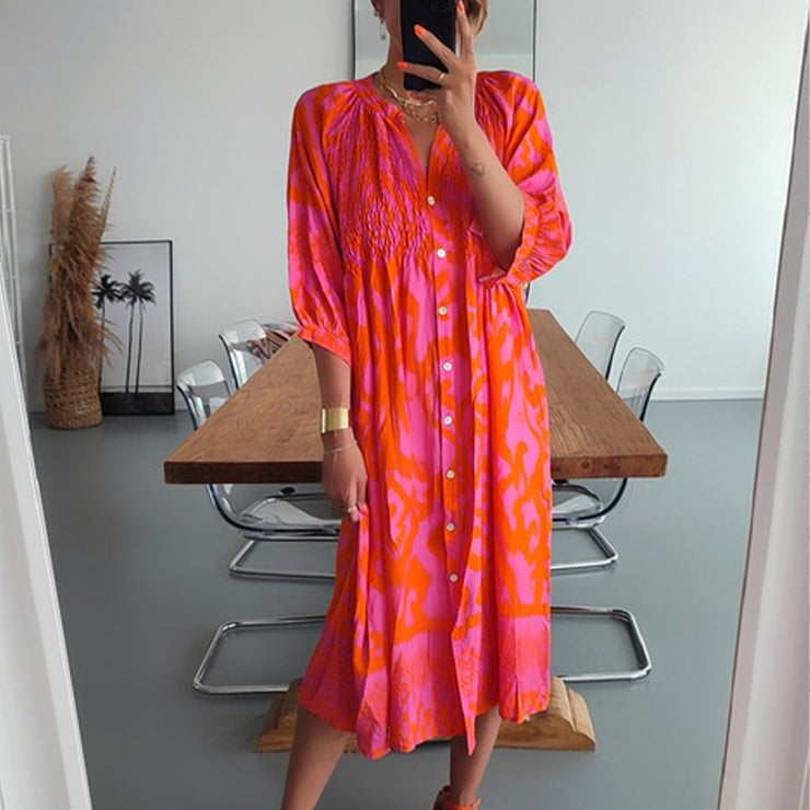 Pink and orange midi dress with ruffled button placket