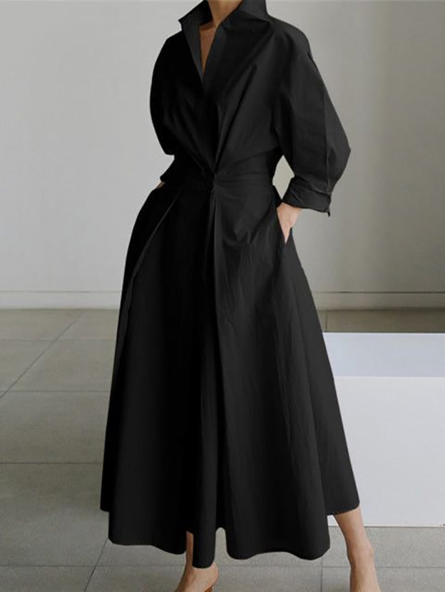 Black maxi dress with turn-up collar and side pockets