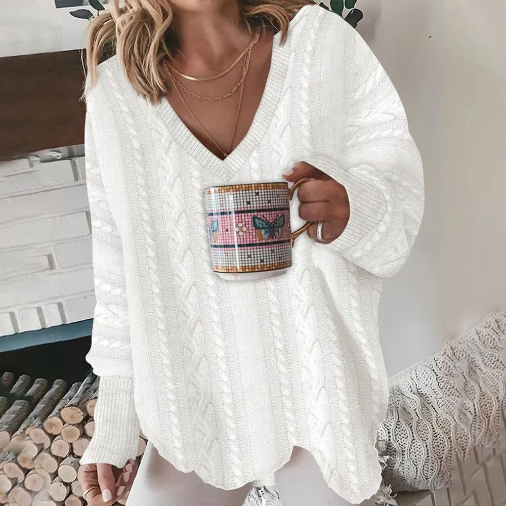 White solid color V-neck sweater with long sleeves