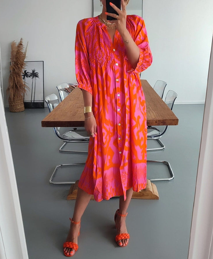 Pink and orange midi dress with ruffled button placket