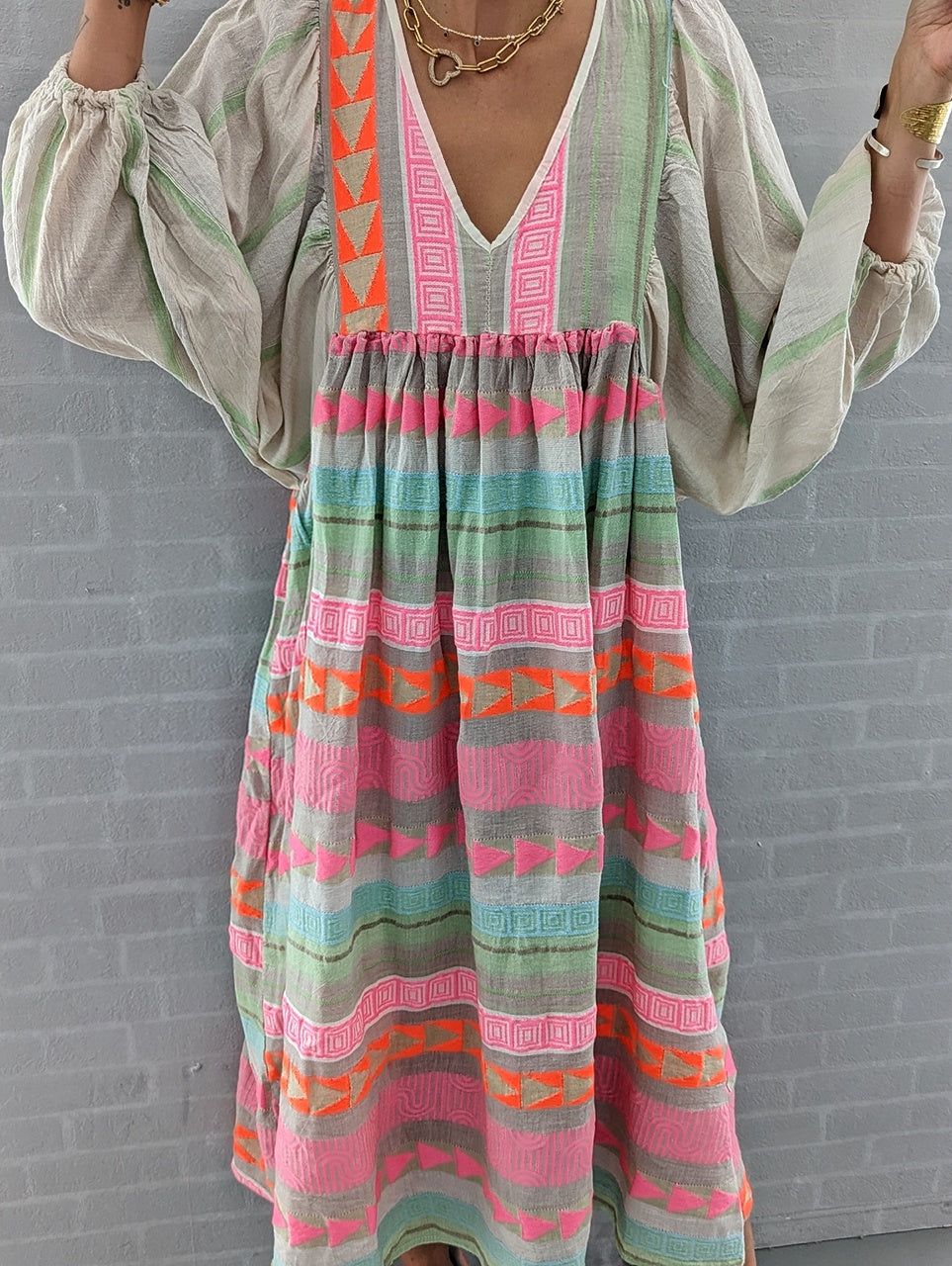 Pink striped midi dress with Greek key and orange chain