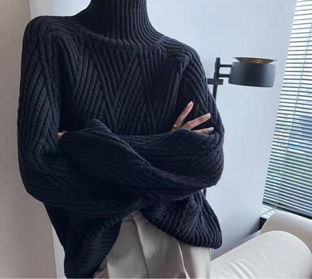 Black monochrome sweater with high neckline