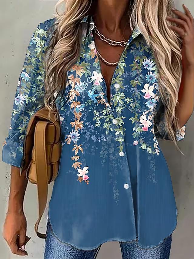 Blue blouse with floral print and leaves