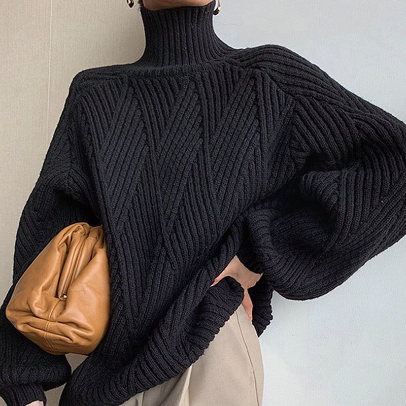 Black monochrome sweater with high neckline