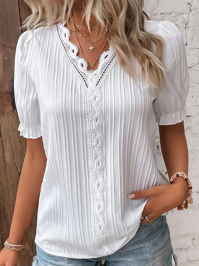 White blouse with V-neck and short sleeves