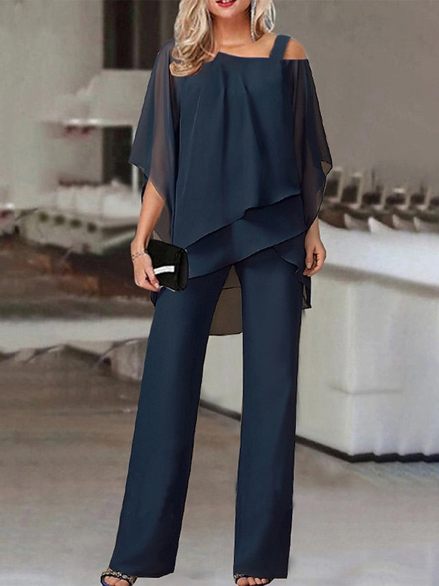 Navy blue two-piece set of gathered top and trousers with cold shoulders