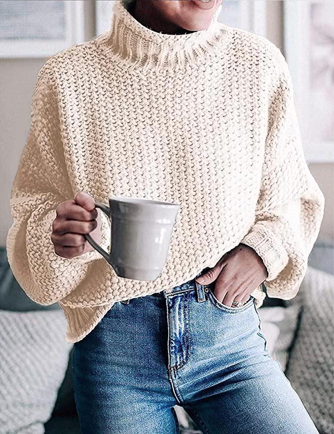 Solid color sweater with long sleeves