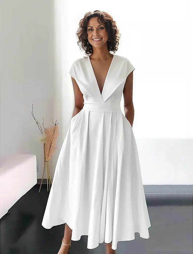 White folding collar maxi dress with deep V-neck and pleat