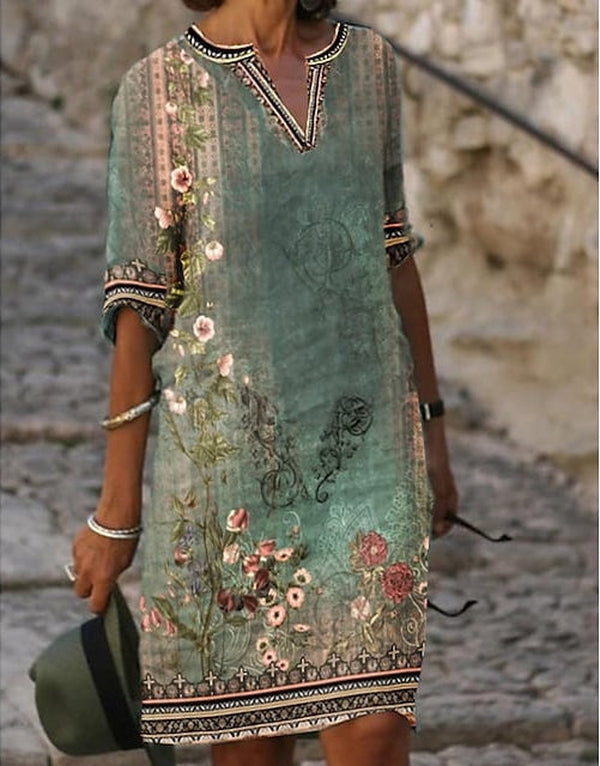 Fancy tunic dress with floral pattern in watercolor look